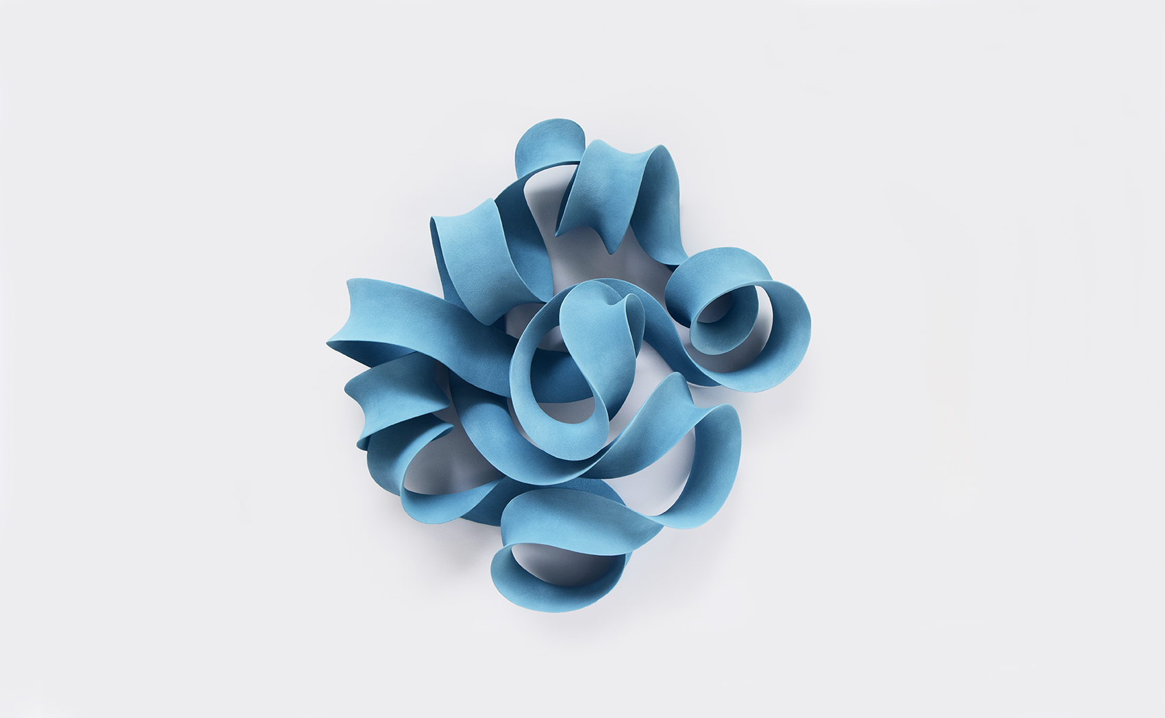 Sinuous Blue, wall mounted ceramic sculpture, 85 x 87 x 34 cm